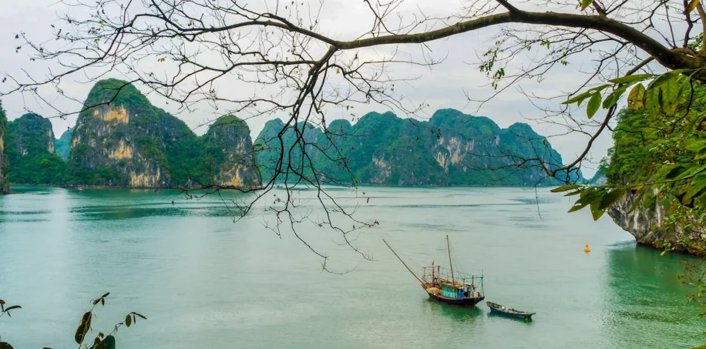 Halong Bay cruise among limestone islands and emerald waters