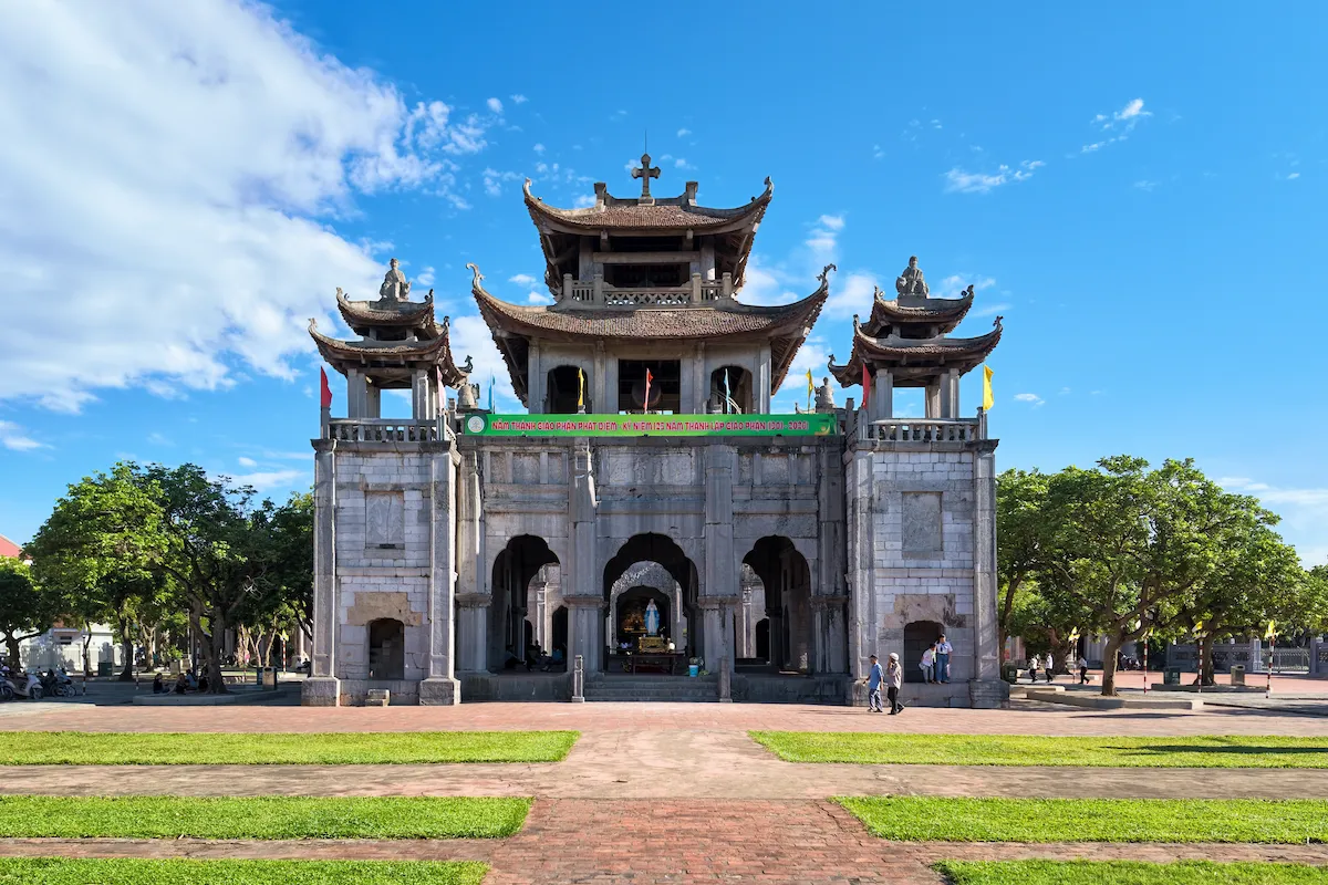 Ninh Binh 1 day itinerary featuring the historic Phat Diem Stone Cathedral