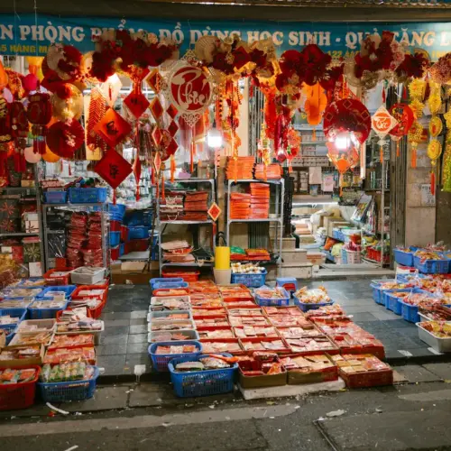 Traditional Vietnamese New Year decorations displayed in an Old Quarter shop