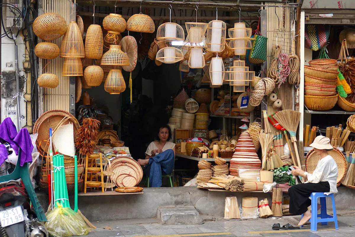 A traditional Hanoi Old Quarter shop displaying woven bamboo baskets and lamps