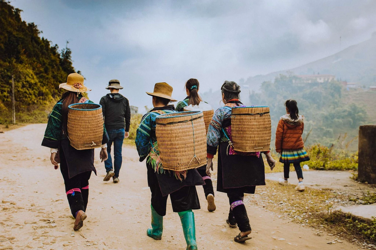 Sapa trekking and itinerary guide for first-time visitors: walking along a Sapa village trail
