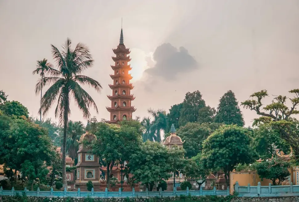 Hanoi 2-day itinerary featuring Tran Quoc Pagoda beside West Lake.